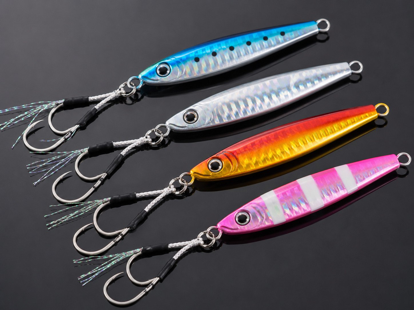 Jigging lures with assist hooks and split rings