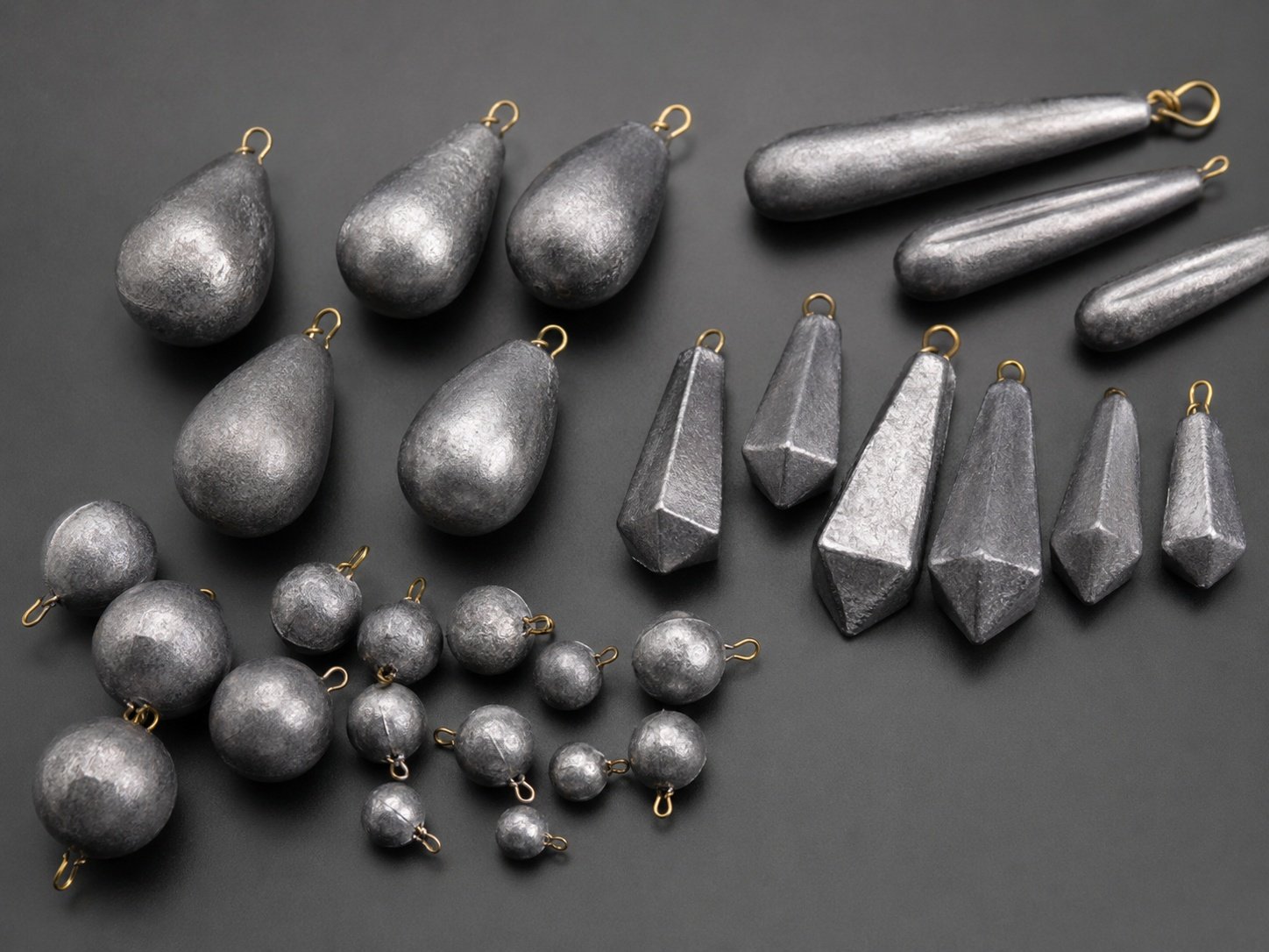 Lead fishing sinkers in multiple shapes and weights