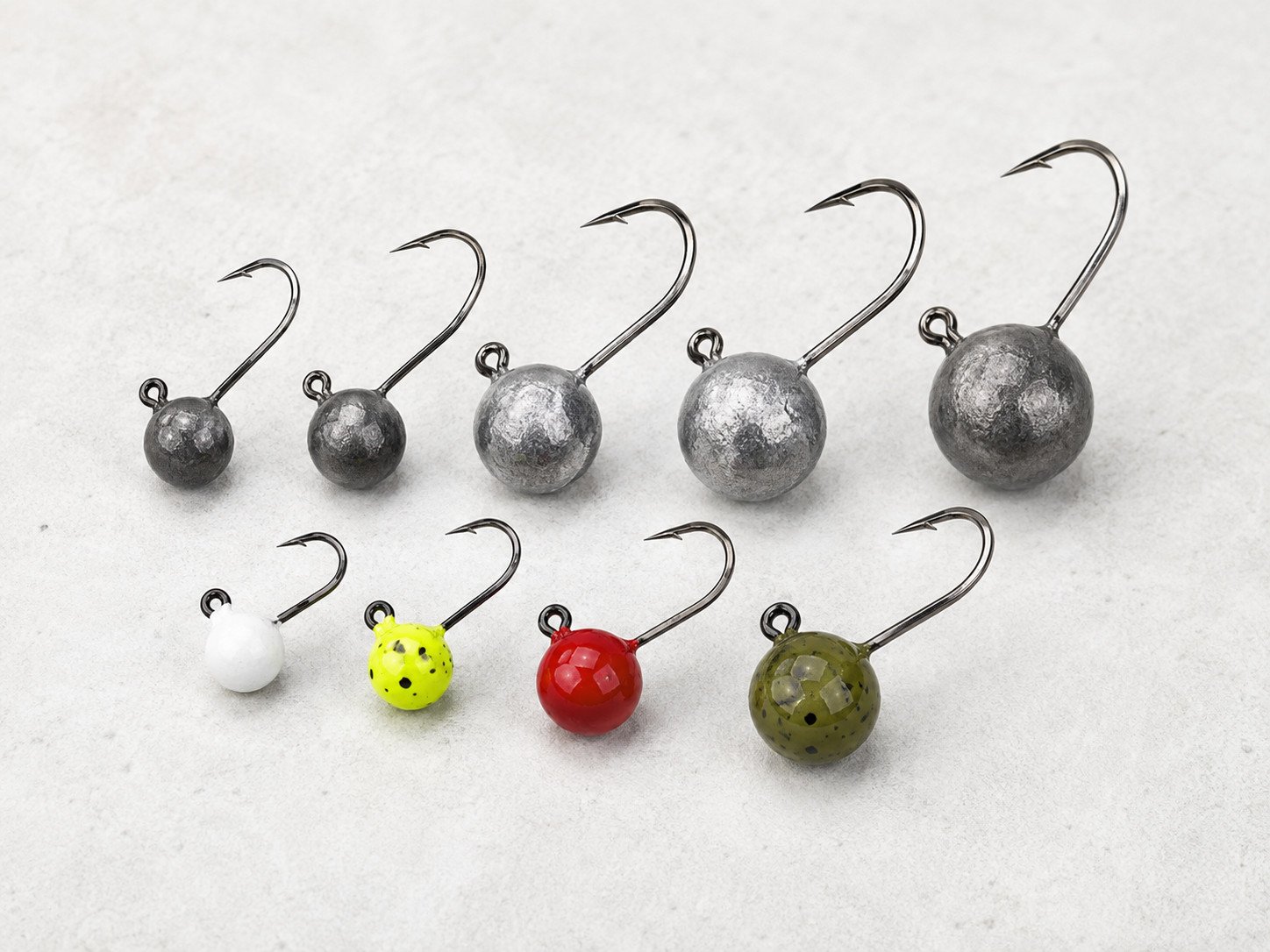 Round jig heads in multiple weights for soft bait fishing