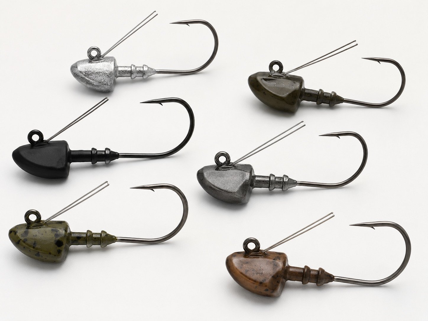 Weedless jig heads with wire guards for soft plastic lures