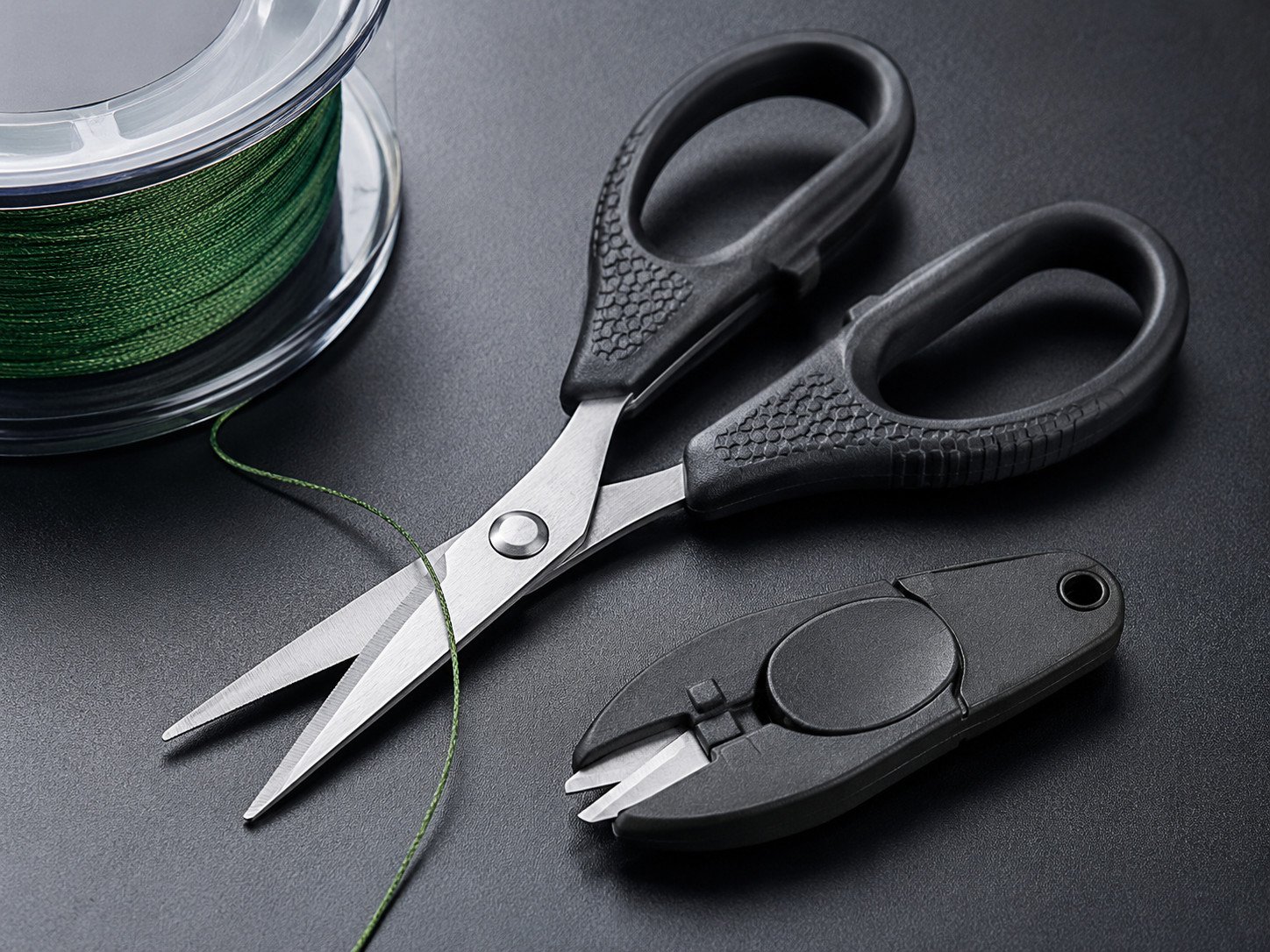 Braid scissors and fishing line cutters for tackle boxes